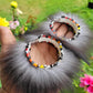50mm Silver Fox hoop earrings with fire colors beaded edges.