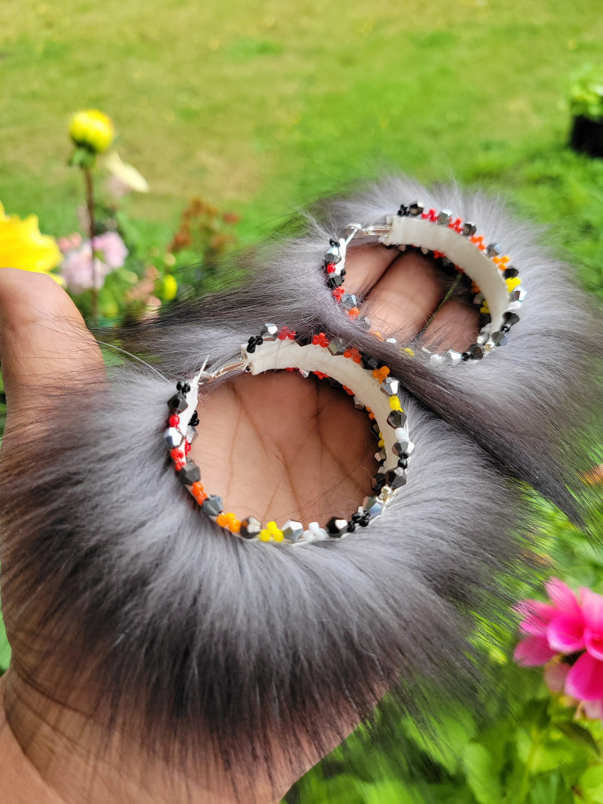 50mm Silver Fox hoop earrings with fire colors beaded edges.