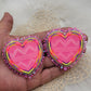 Stacked neon glow hearts