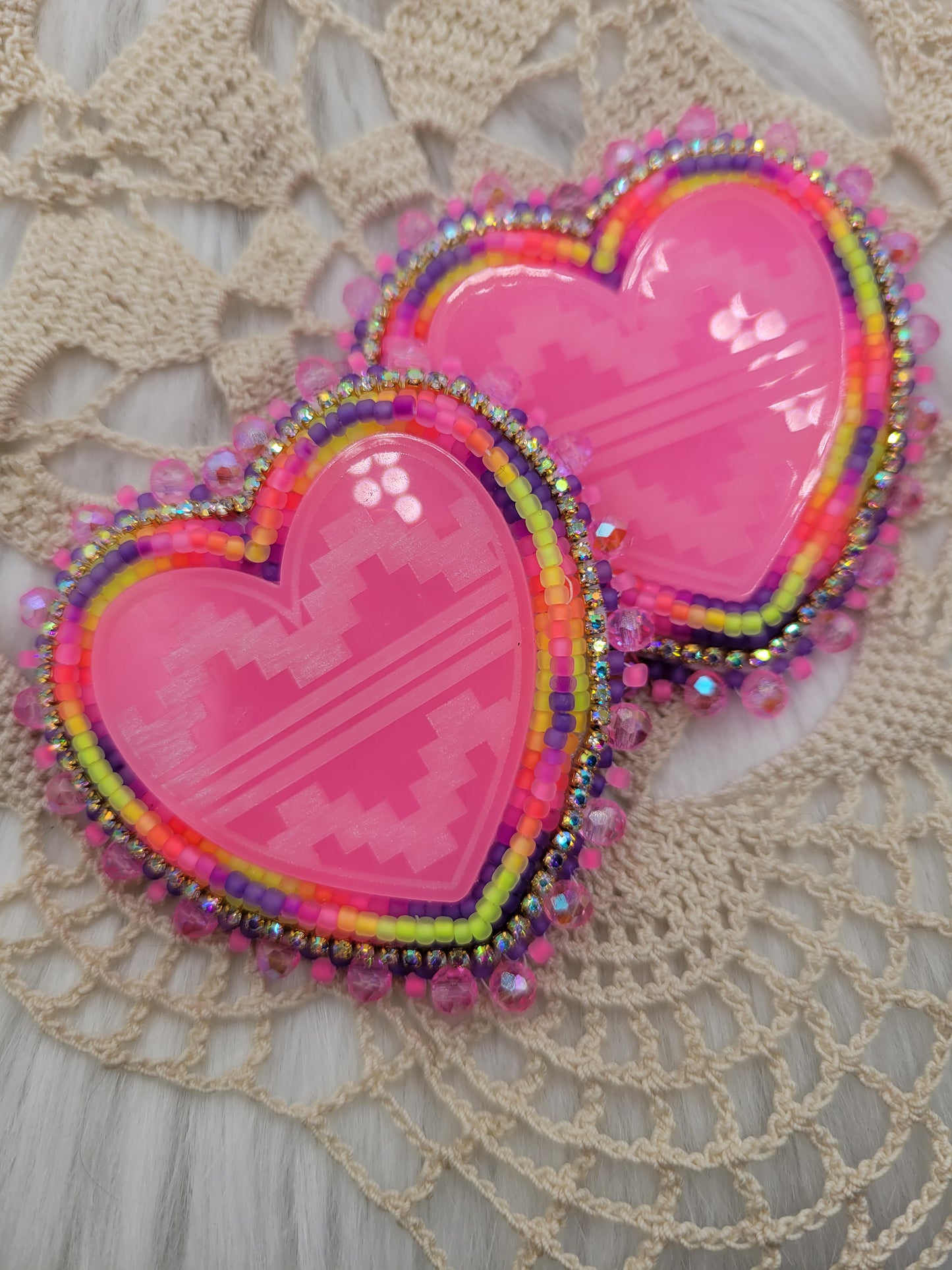 Stacked neon glow hearts