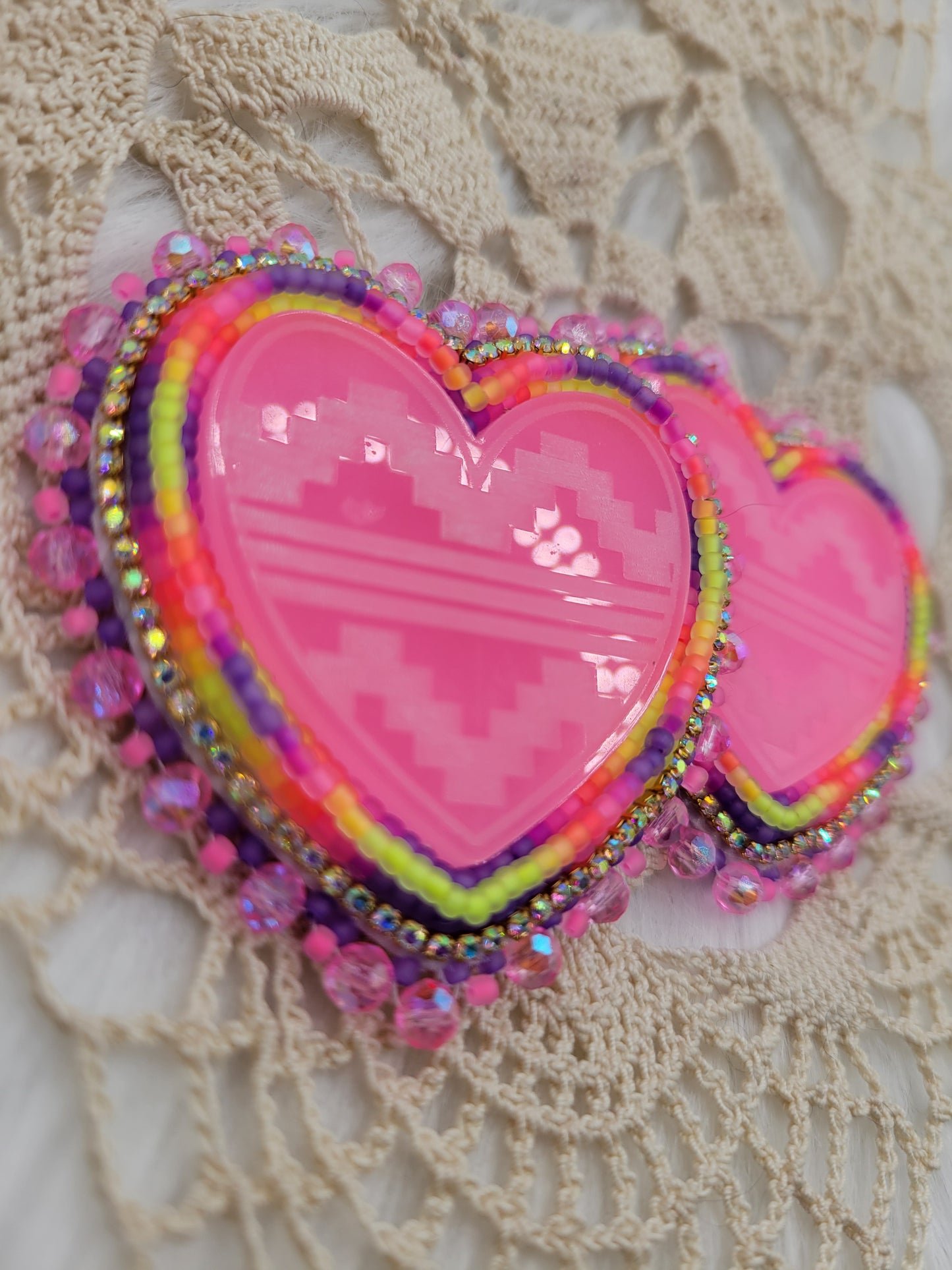 Stacked neon glow hearts