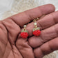 Matte red berry beaded earrings