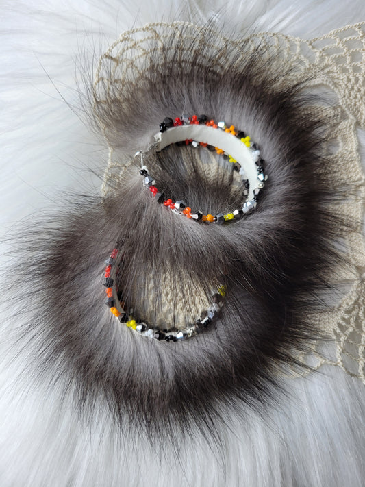 50mm Silver Fox hoop earrings with fire colors beaded edges.