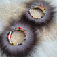 50mm Silver Fox hoop earrings with fire colors beaded edges.