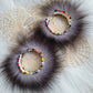 50mm Silver Fox hoop earrings with fire colors beaded edges.