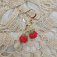 Matte red berry beaded earrings