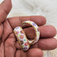 Flower beaded hoop earrings